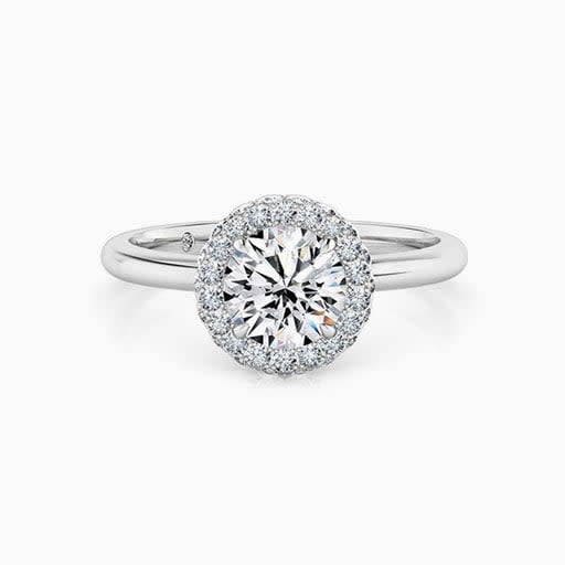 Round Brilliant Cut Diamond With A 3d Halo Engagement Ring