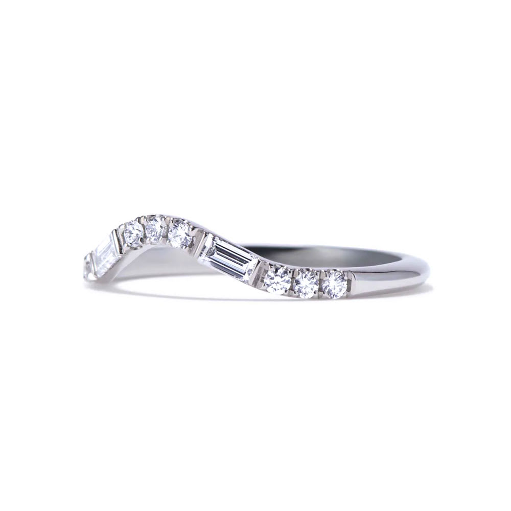 Baguette and round curve ring