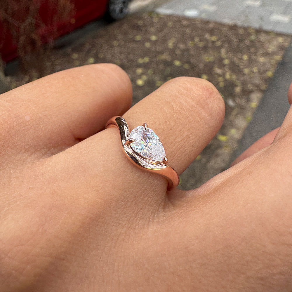 Lab grown diamond on a wave gold band