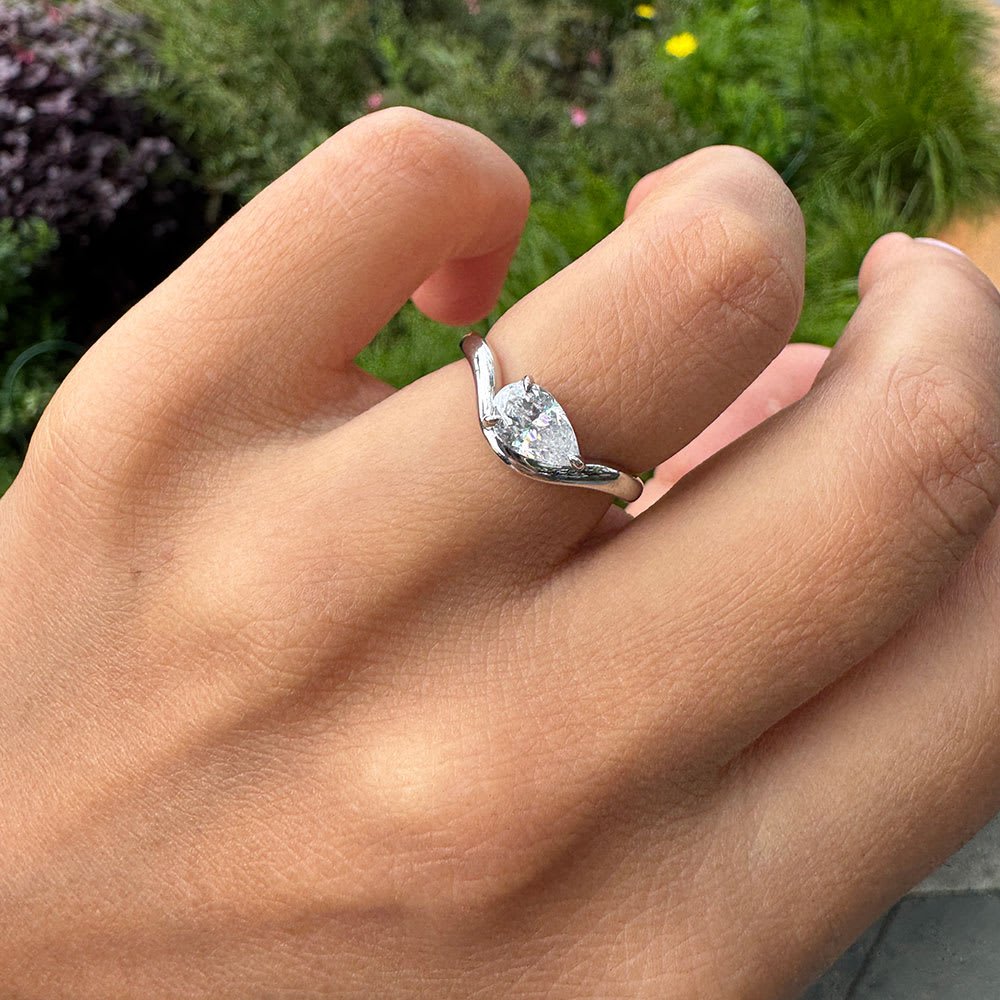 Lab grown diamond on a wave gold band