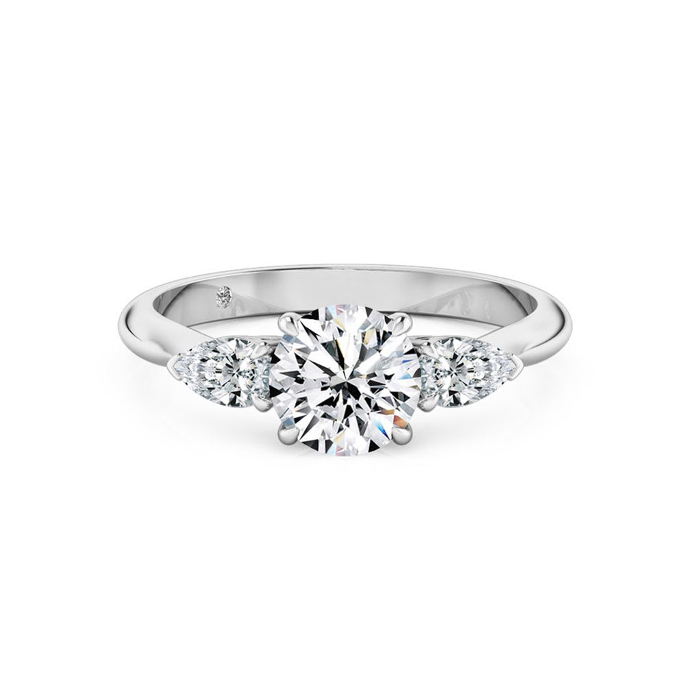 Round Diamond With side pear cut Engagement Ring