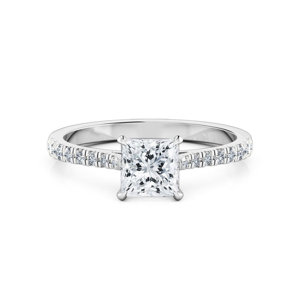 SH Jewellery - Classic semi-halo engagement ring An intricate 18kt white  gold diamond ring featuring a combination of three-stone ring and semi-halo  design. The medium width band is claw set with round