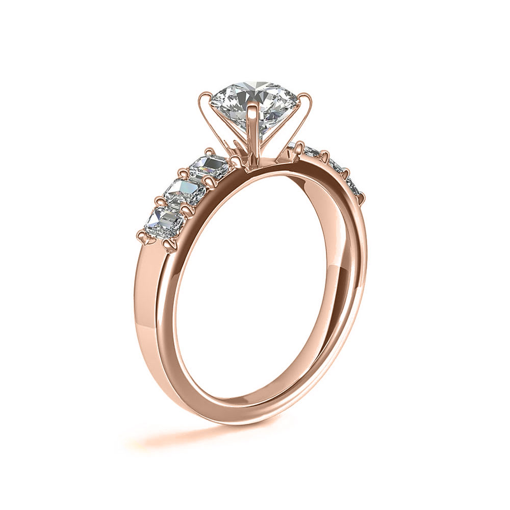 Brilliant Round And Emerald Cut Diamond Engagement Ring