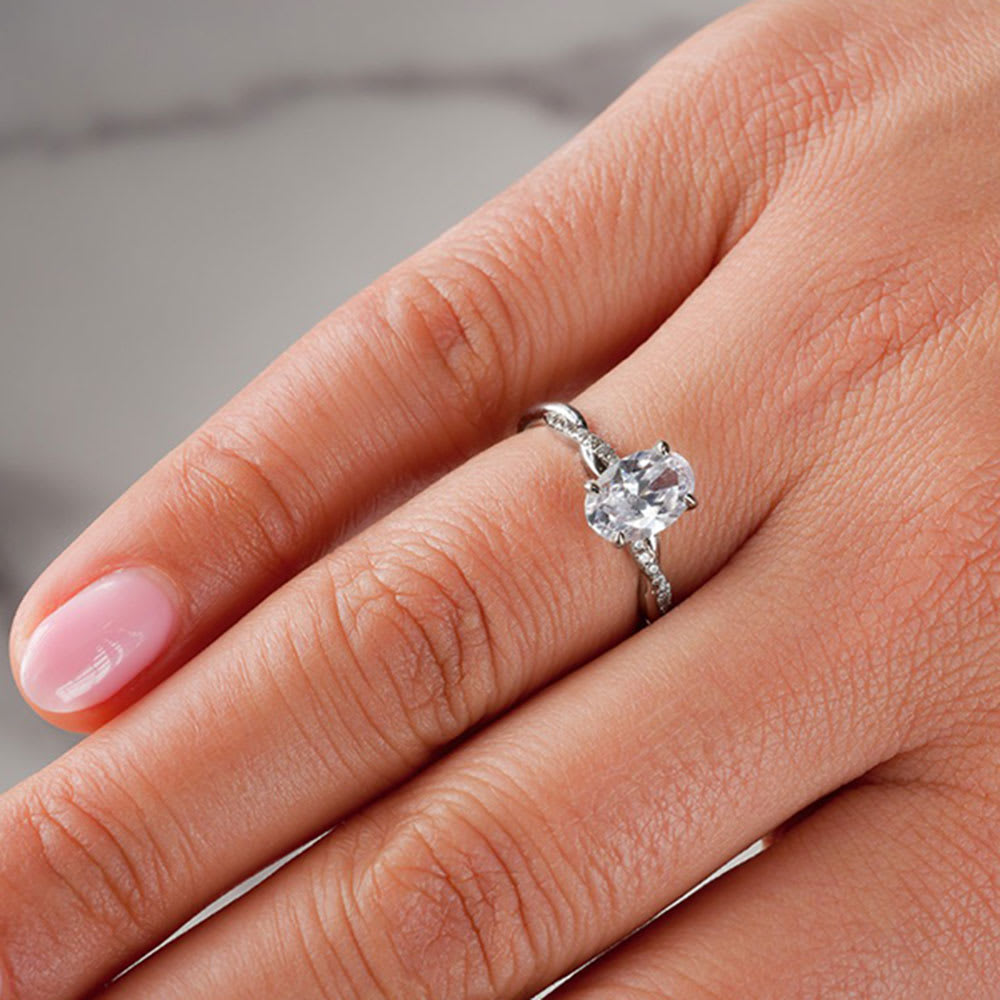 Lab oval diamond on a twisted band engagement ring