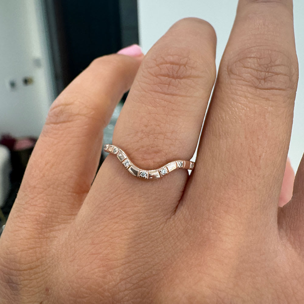 Nesting wedding band with drop set