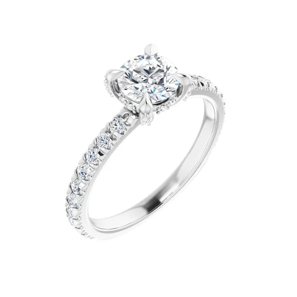 Tiger prong solitaire engagement ring