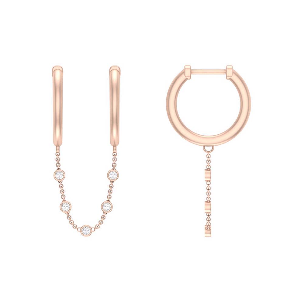 Two piercing earrings and natural diamonds