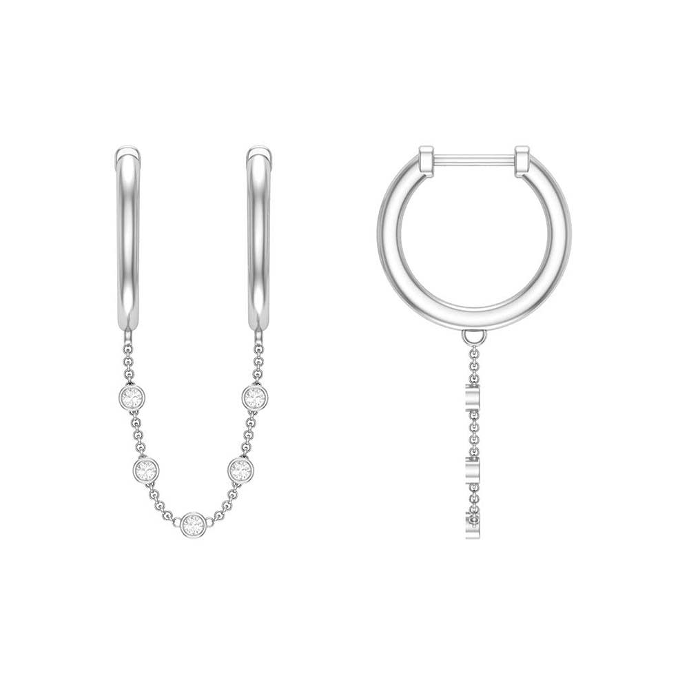 Two piercing earrings and natural diamonds