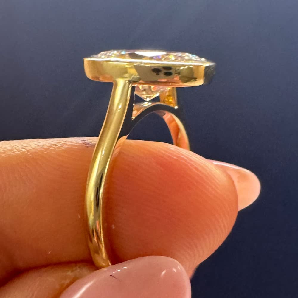 Lab Oval cut in a bezel setting