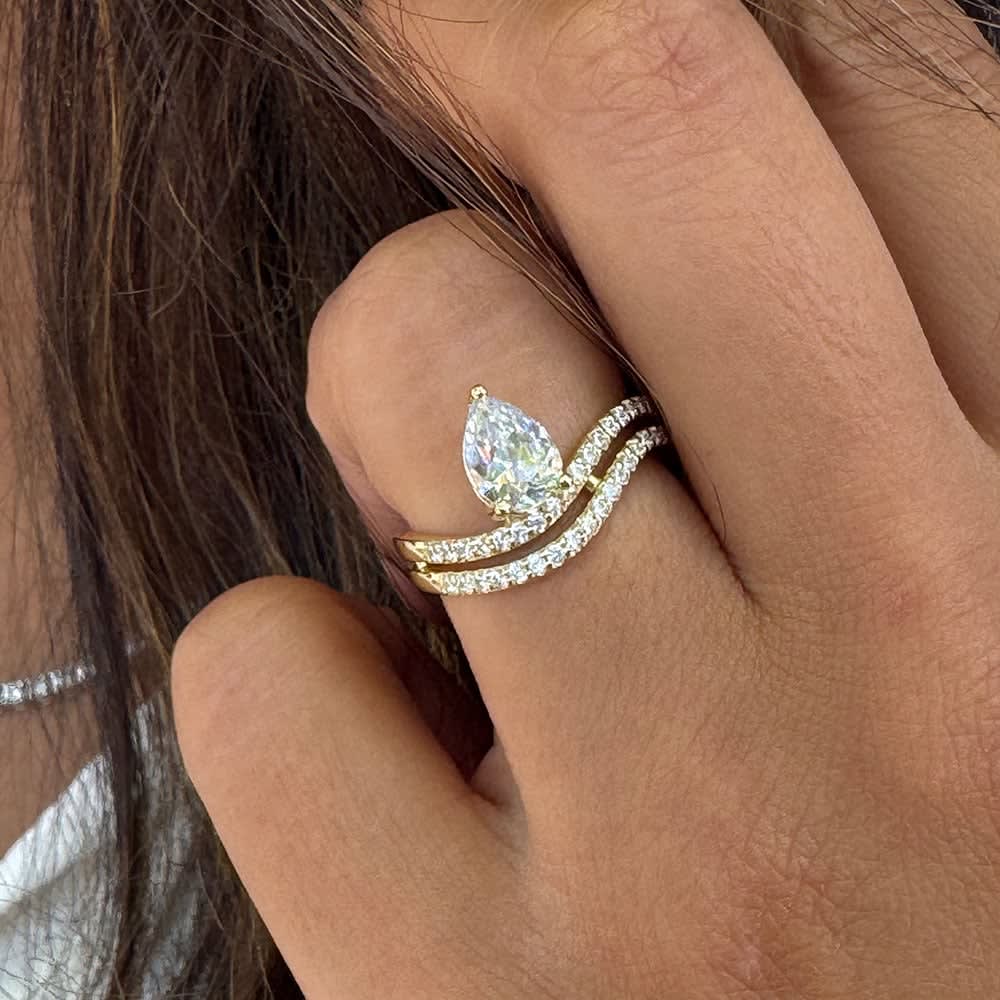 Pear double band solitaire ring