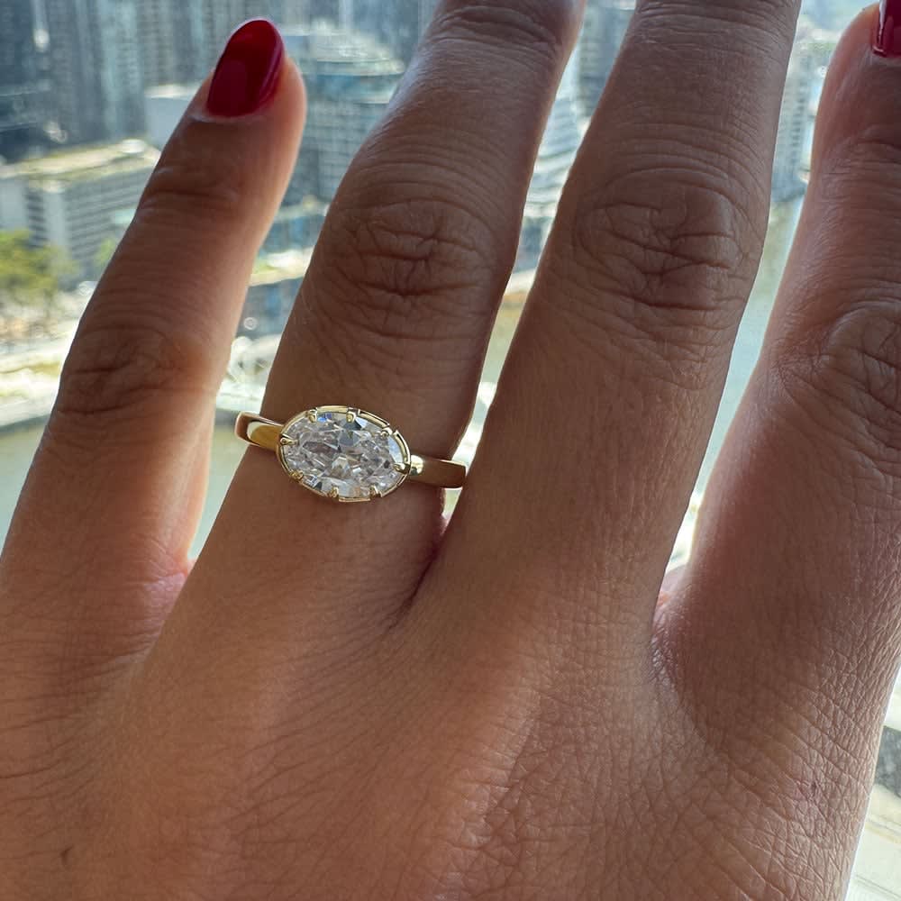 Oval east west solitaire ring