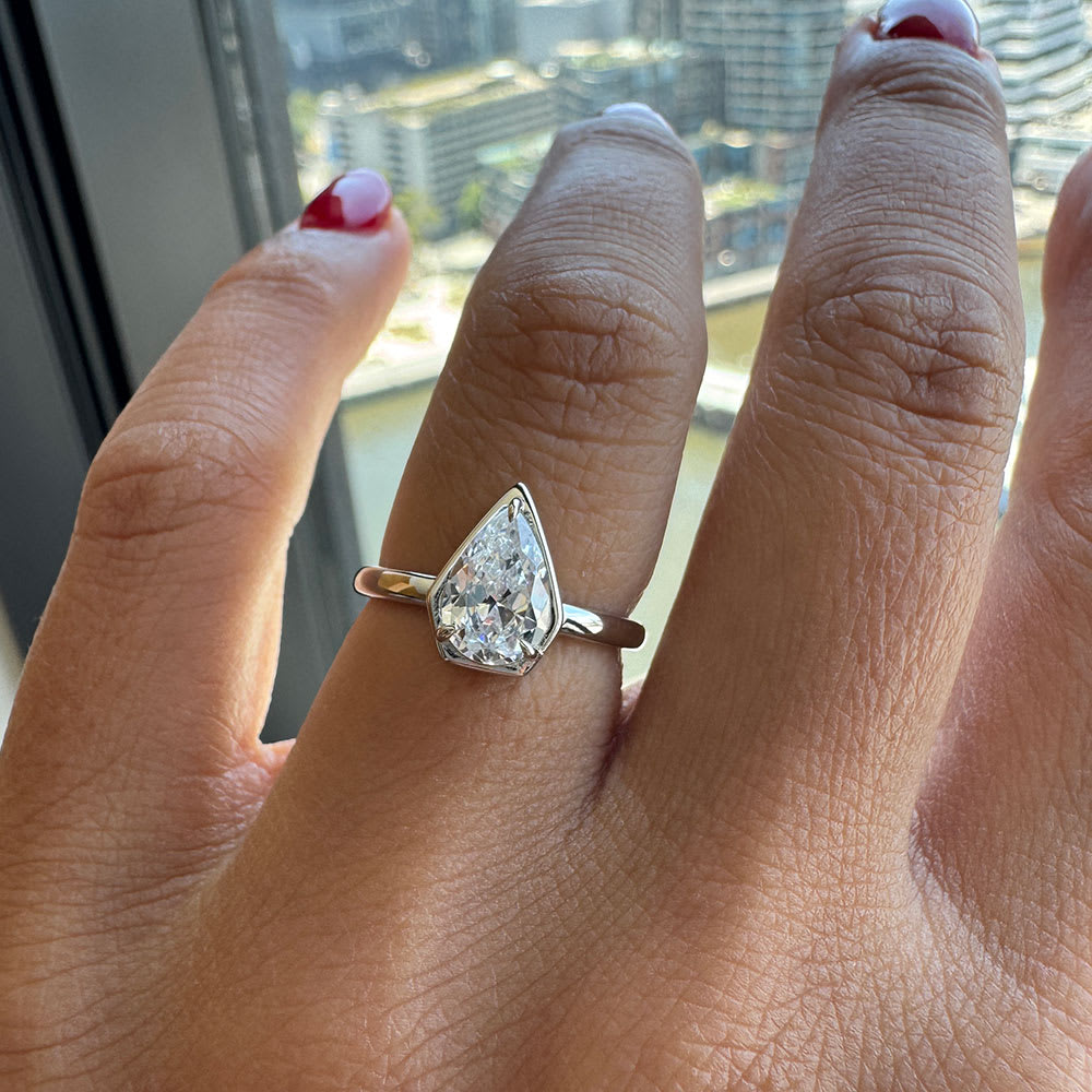 Pear cut diamond set in low setting