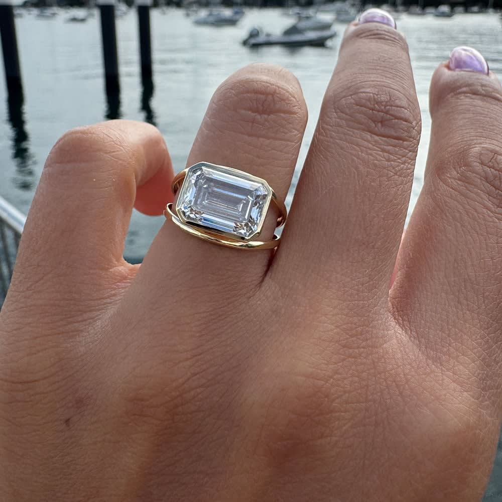 5ct east west emerald cut engagement ring