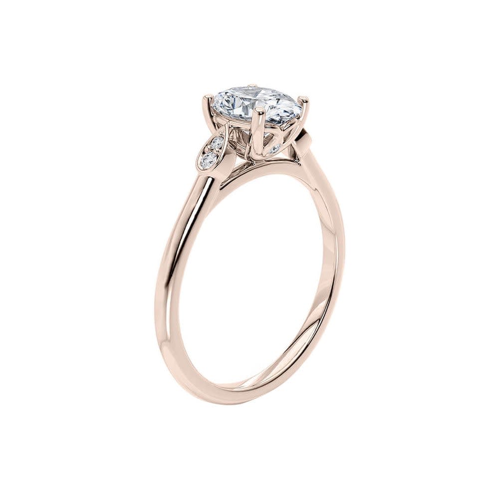 Oval Diamond ring with bezel set side stones