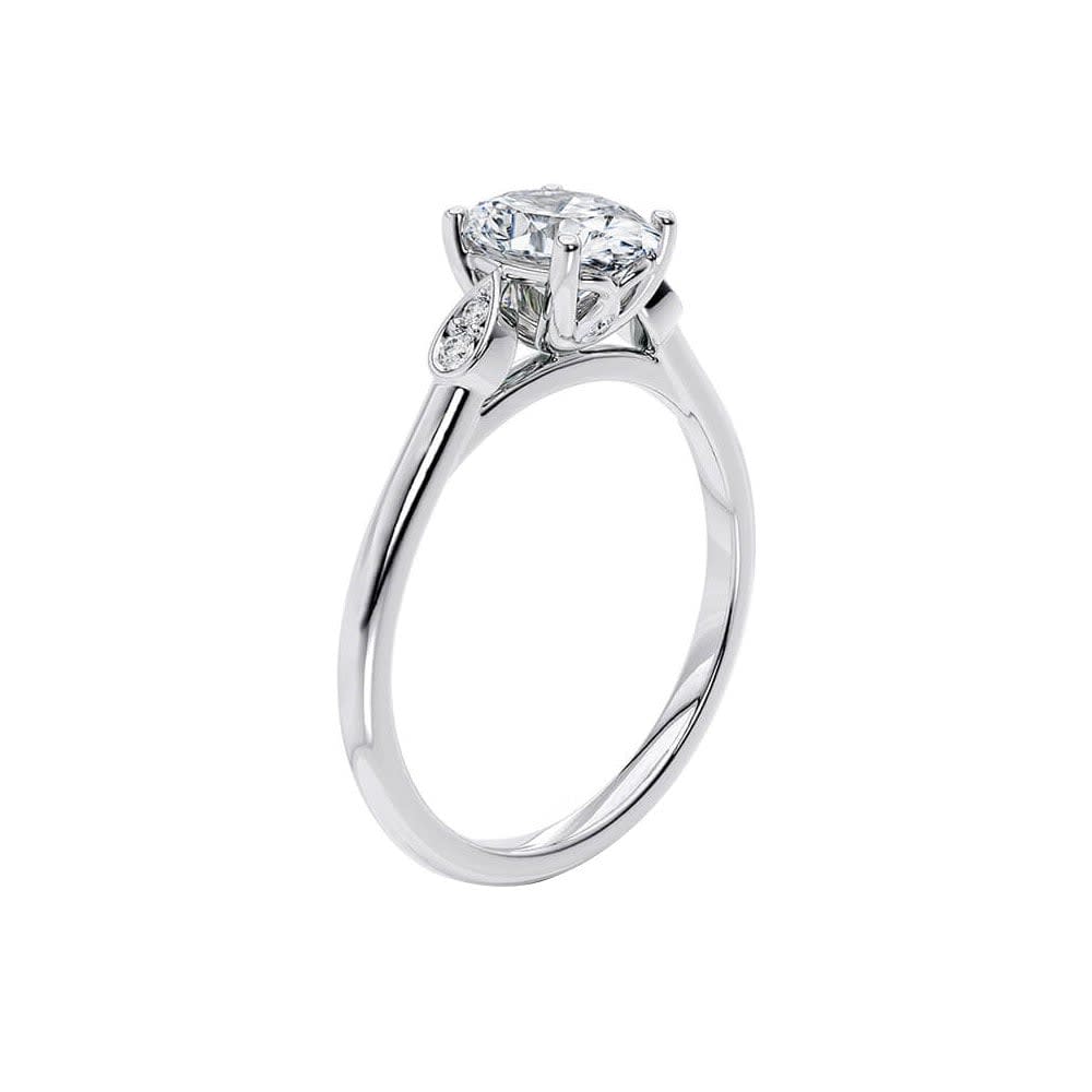 Oval Diamond ring with bezel set side stones