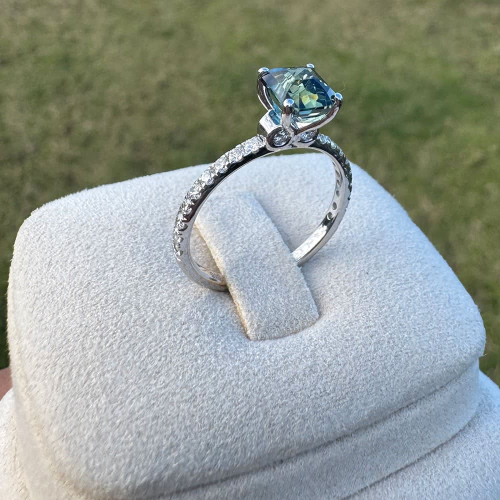 Natural teal sapphire and diamond ring White gold