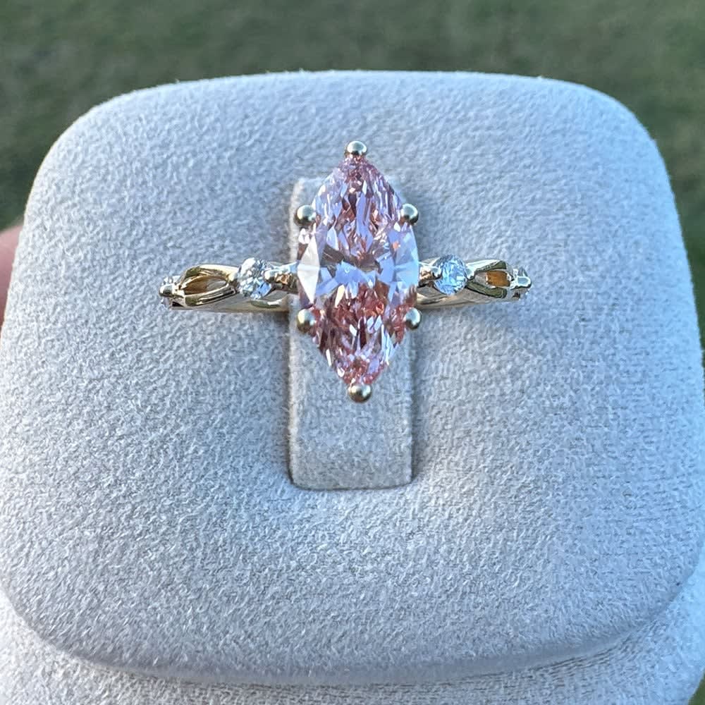 Fancy vivid pink marquise diamond ring