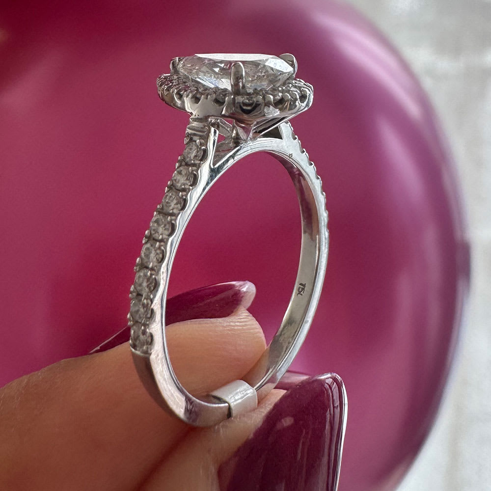 Classic pear with a halo and diamond band