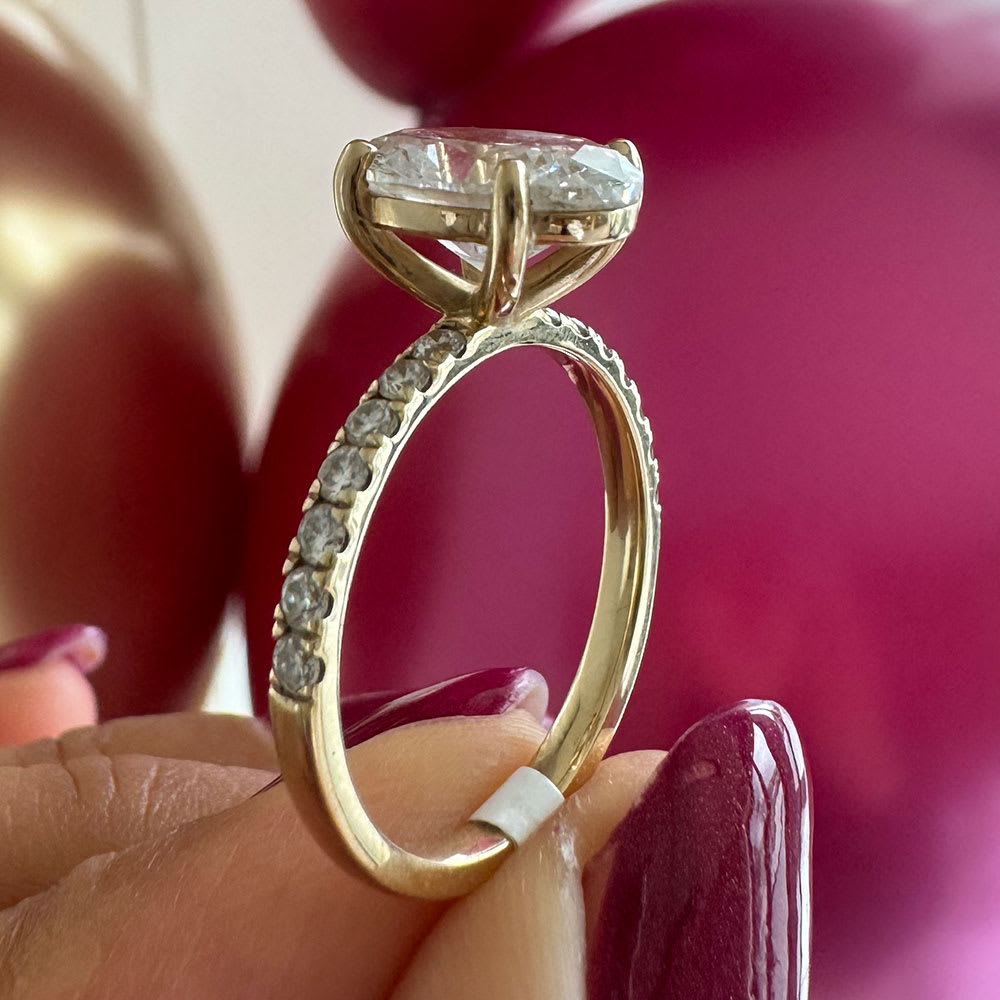 3ct oval lab diamond on a diamond band