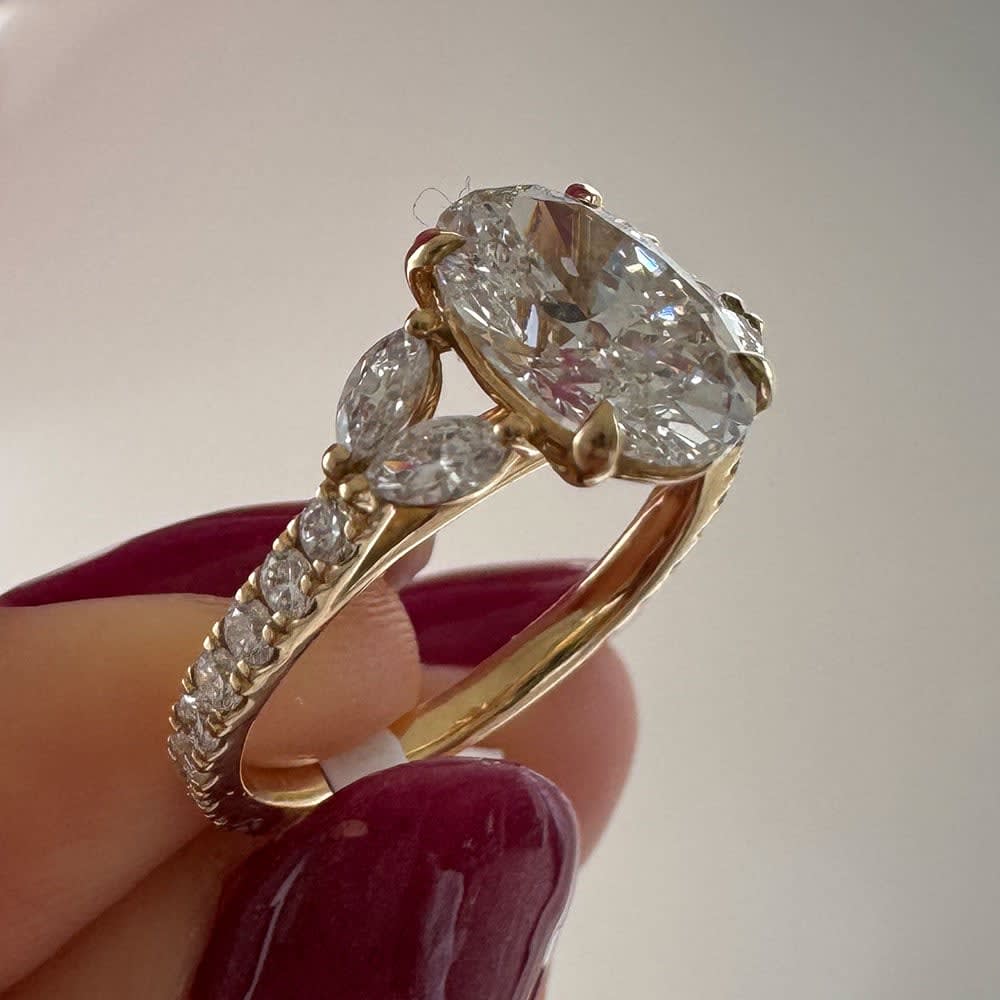 2 carat oval with marquise on the side