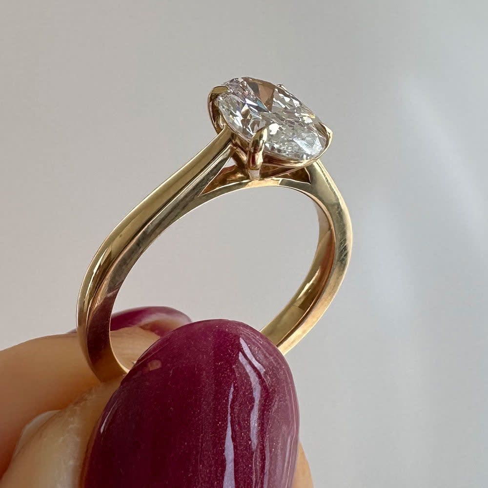 1 carat oval in yellow gold setting