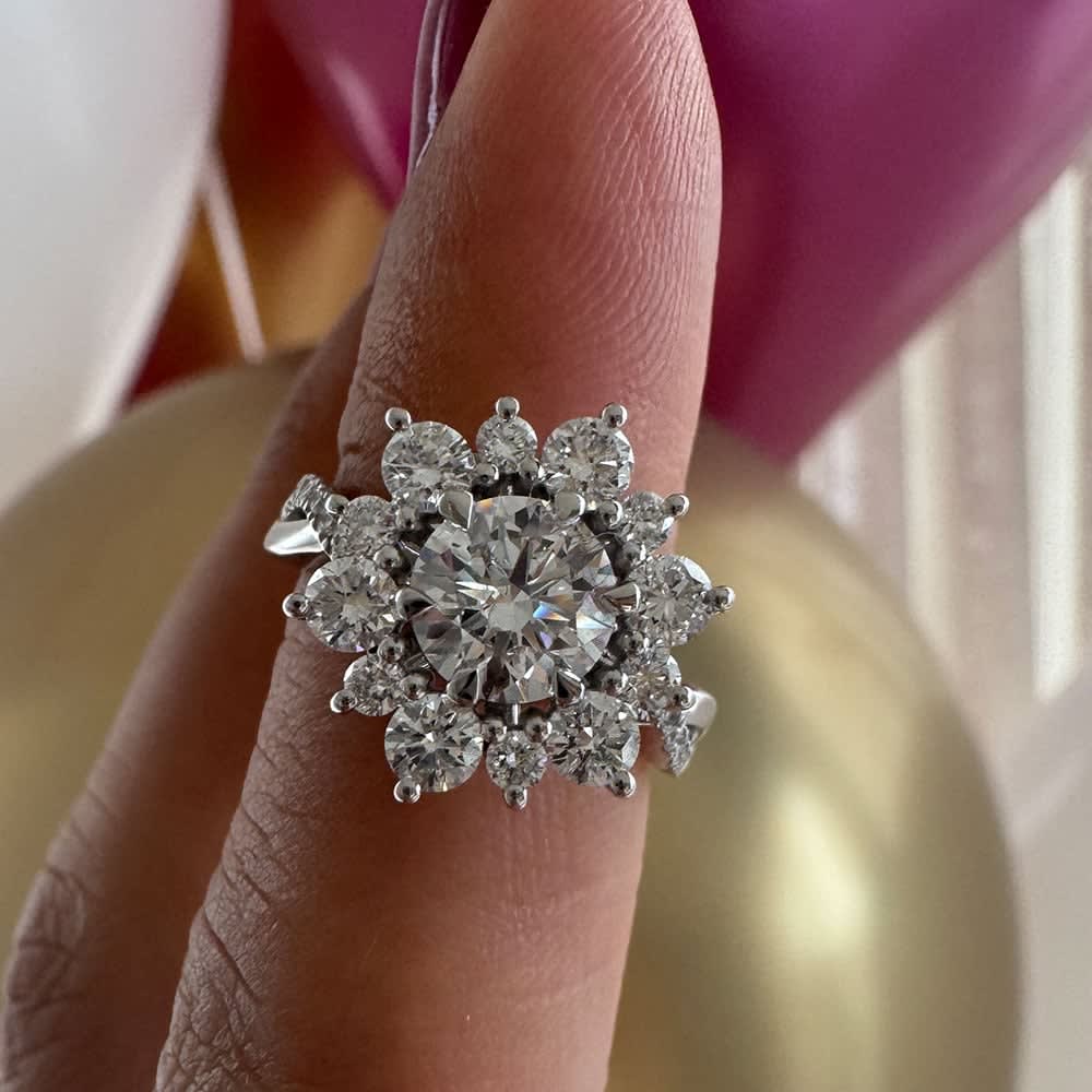 Floral design with 1ct center stone