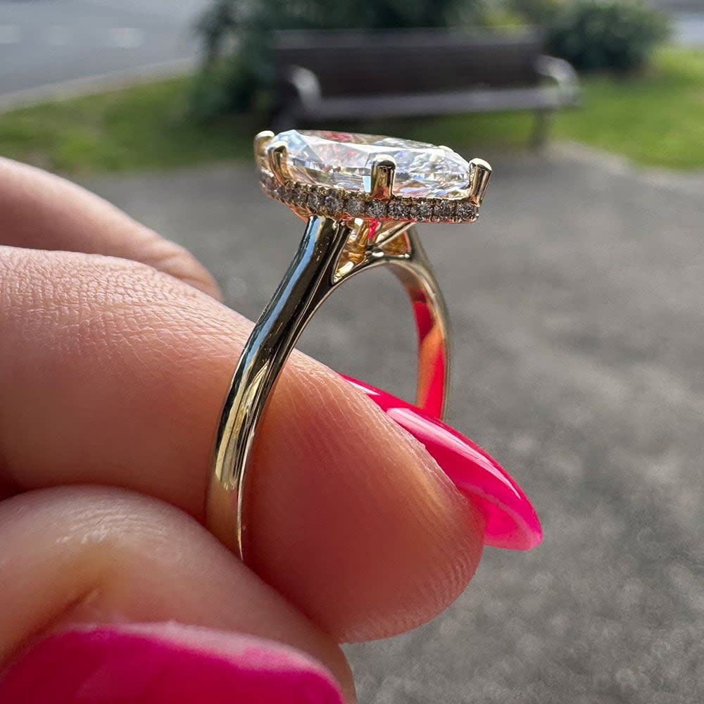 Marquise diamond with a floating halo