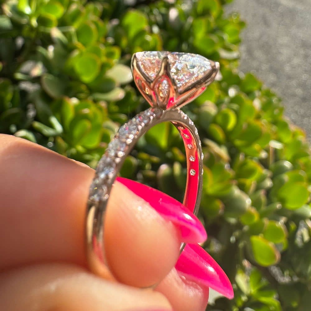2 carat E VVS2 oval with tulip setting