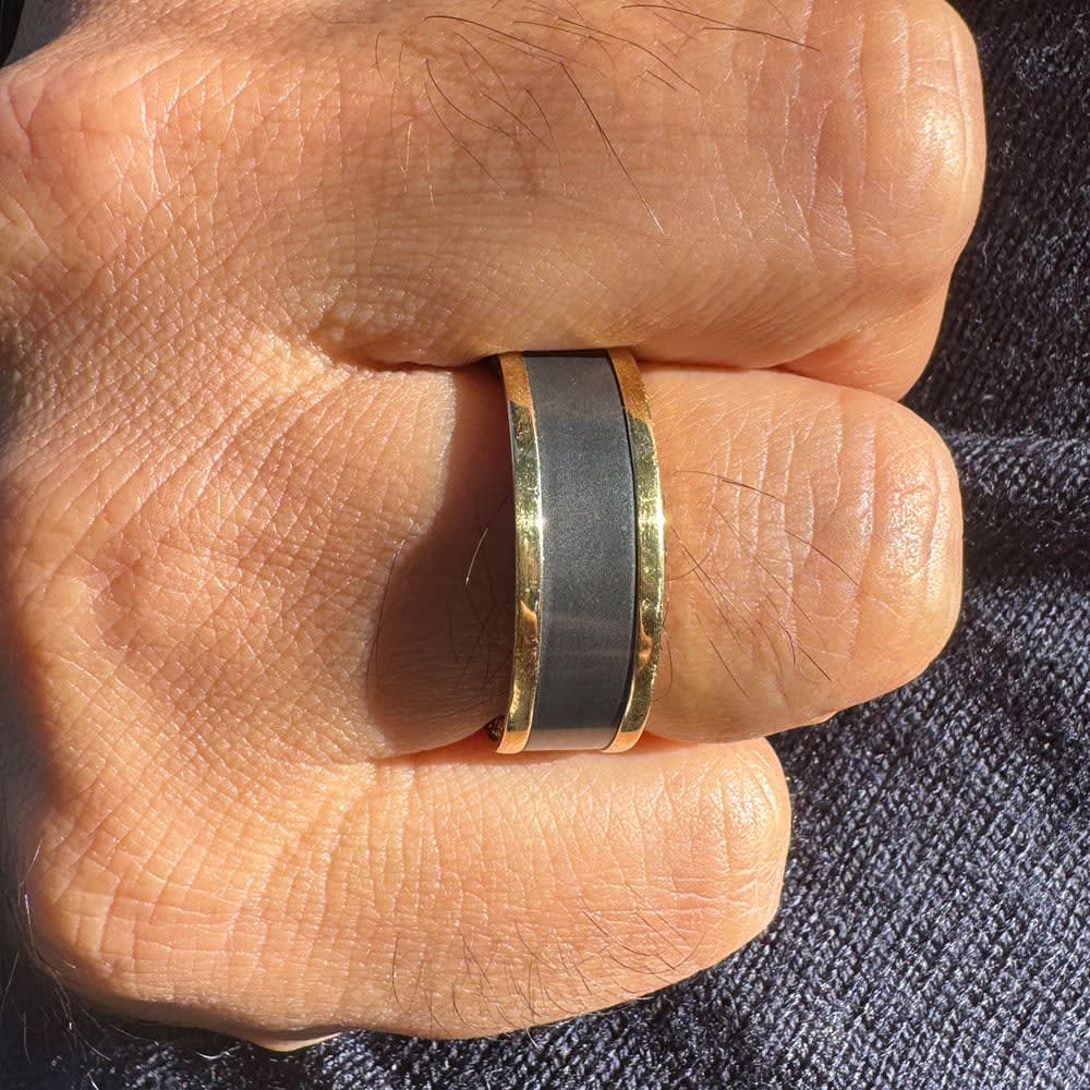 Elysium on gold band with black diamond
