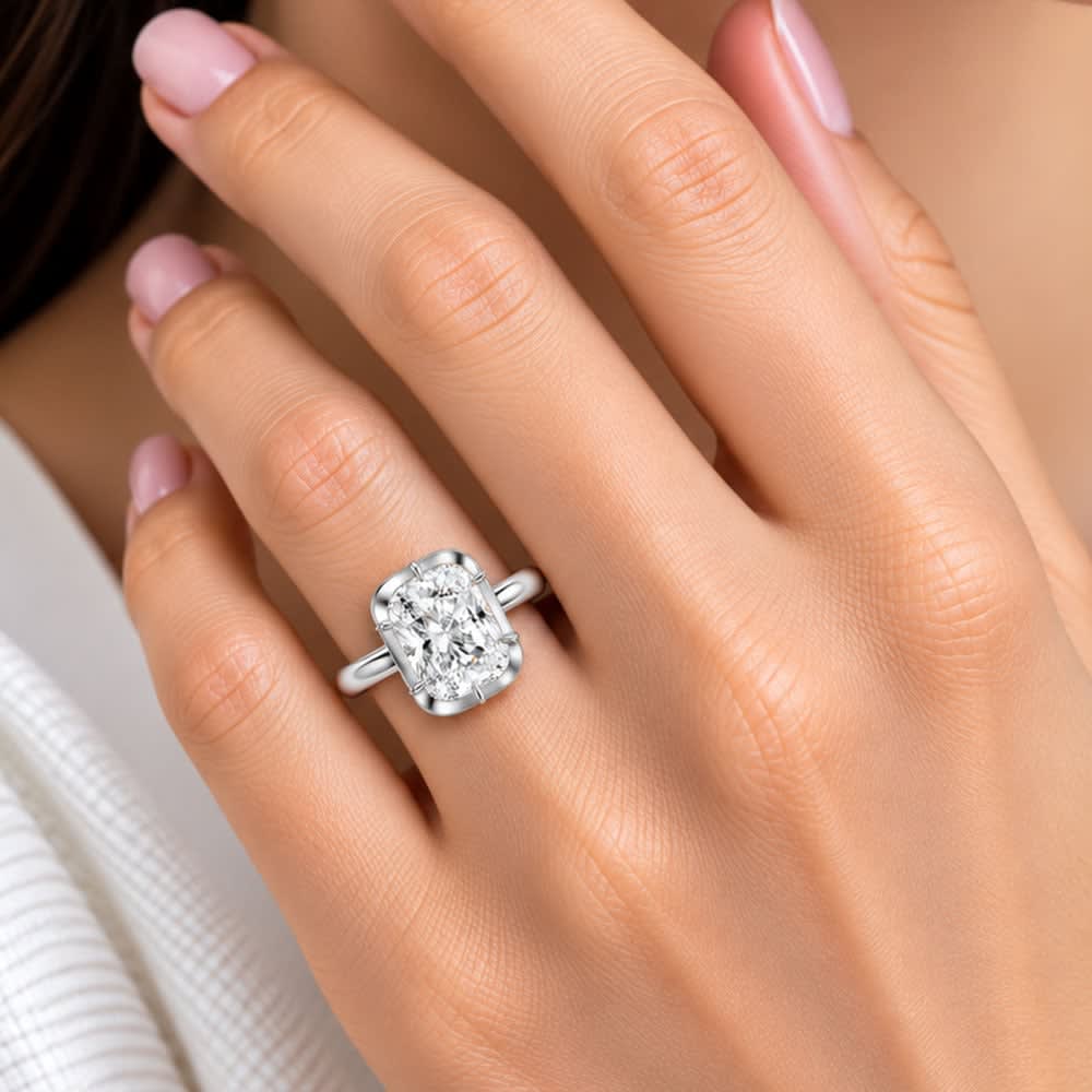 Cushion cut set on a solid setting