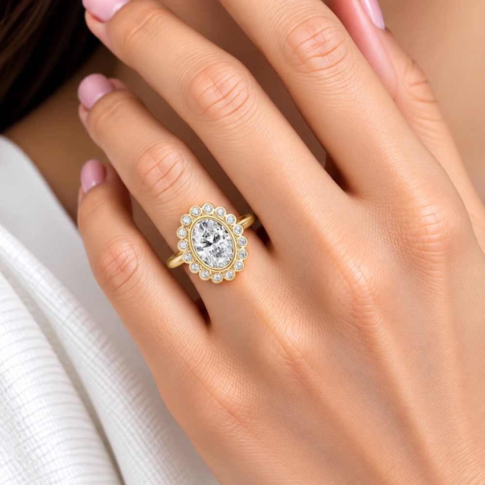 oval diamond with bezel set halo