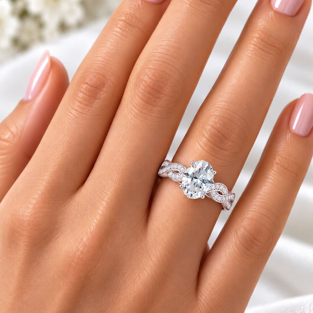 Oval ring on a diamond twisted band