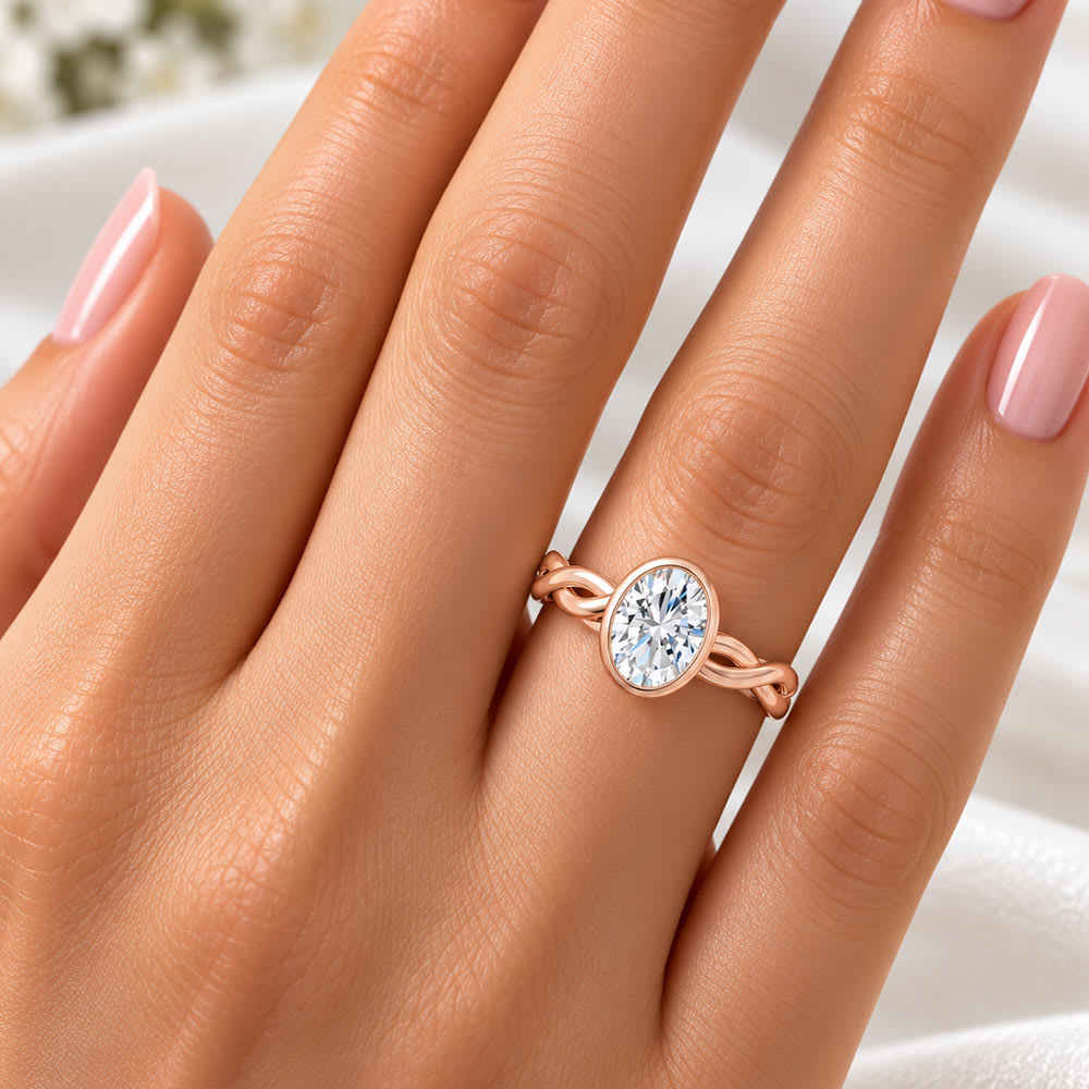 Twisted band with bezel setting oval