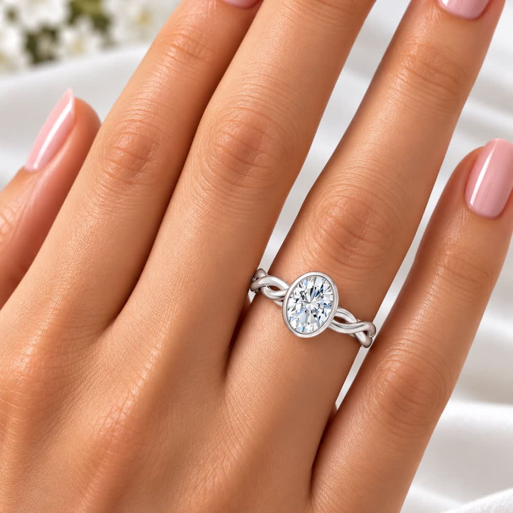 Twisted band with bezel setting oval
