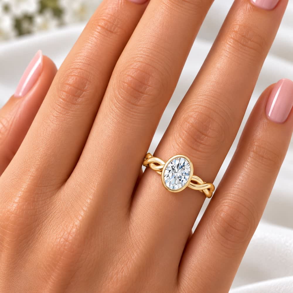 Twisted band with bezel setting oval