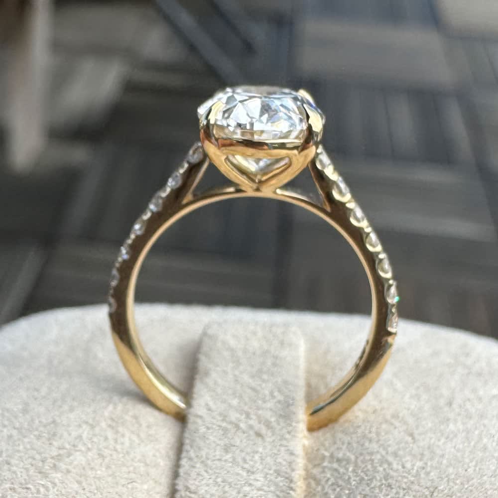 Yellow gold oval lab diamond with diamond band