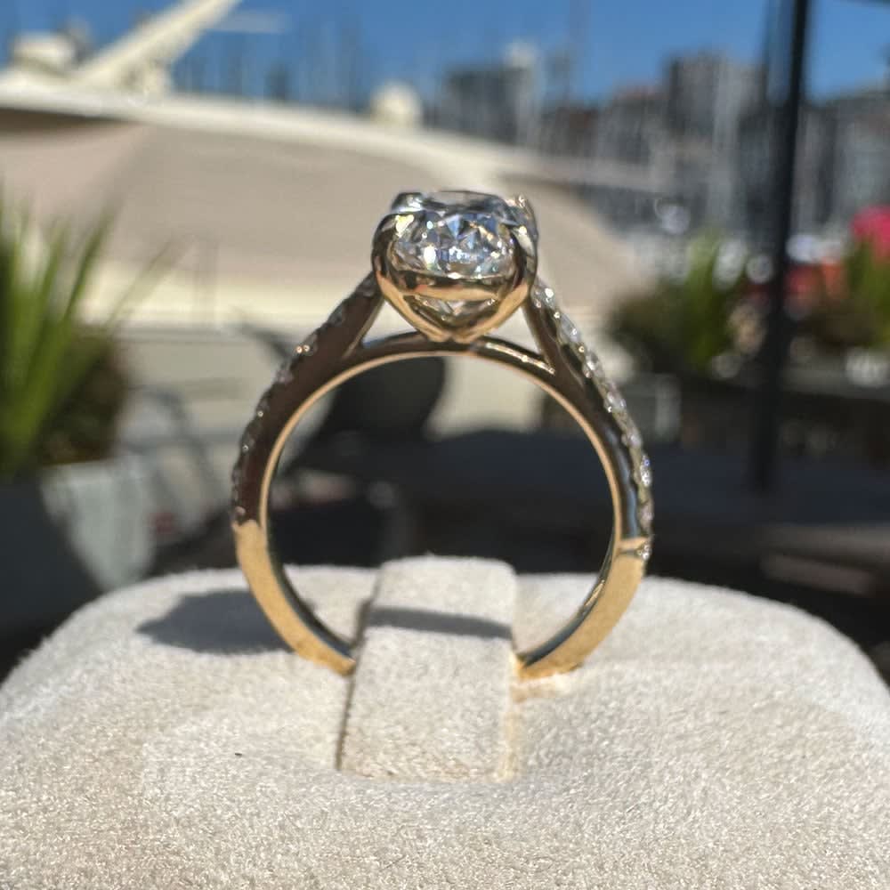 Oval lab diamond with yellow gold setting
