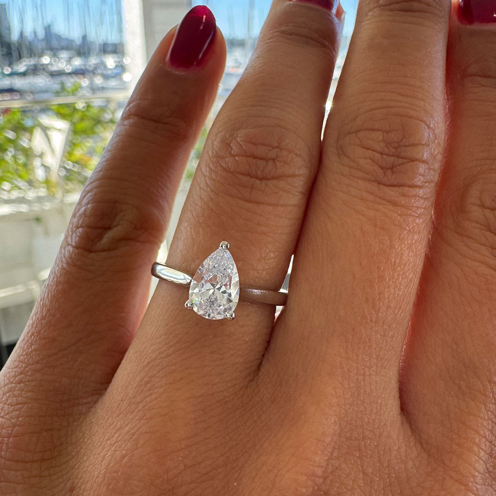 Pear solitaire engagement ring