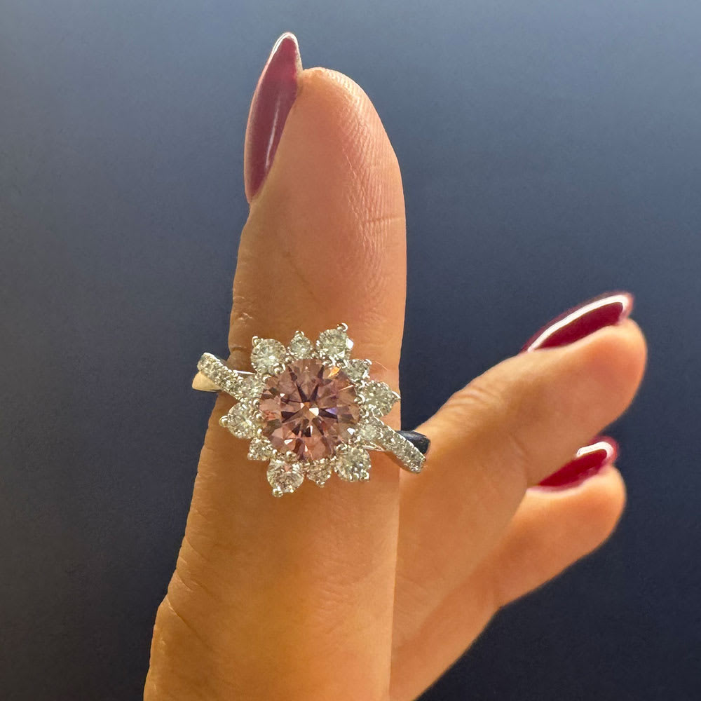 Pink diamond on a floral setting