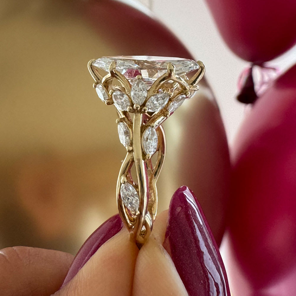 Marquise diamond ring with 3ct center stone
