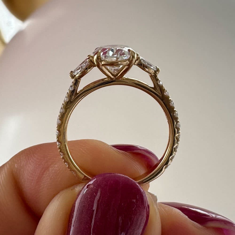 2 carat oval with marquise on the side