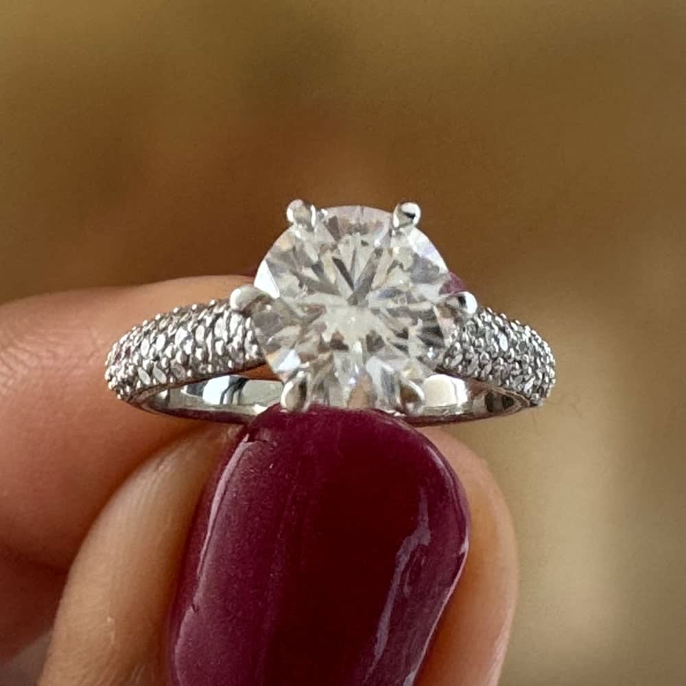 Pave set band with round diamond