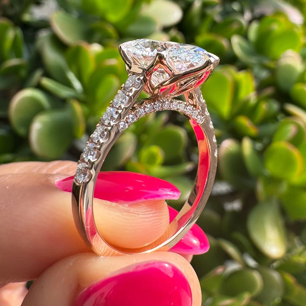 3 carat D VVS1 oval on a tulip setting