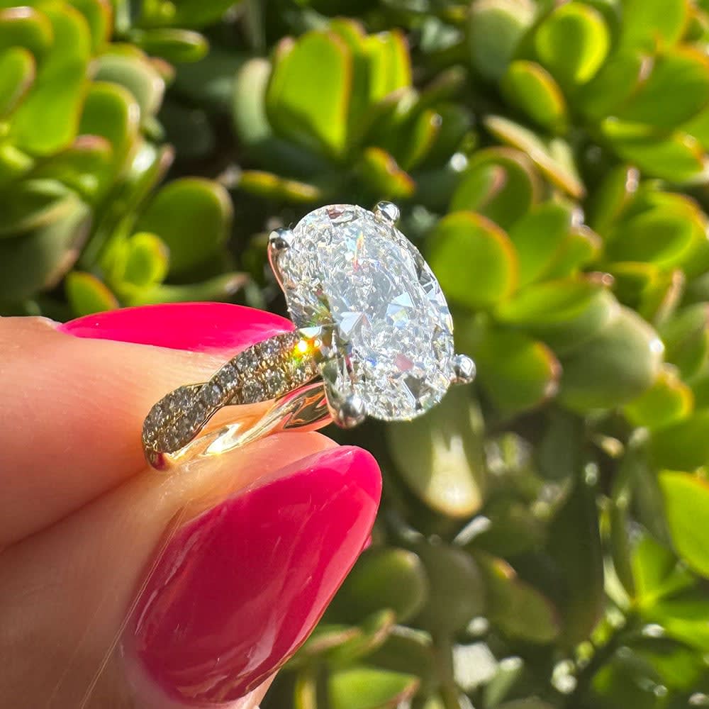 Oval on a twisted band engagement ring