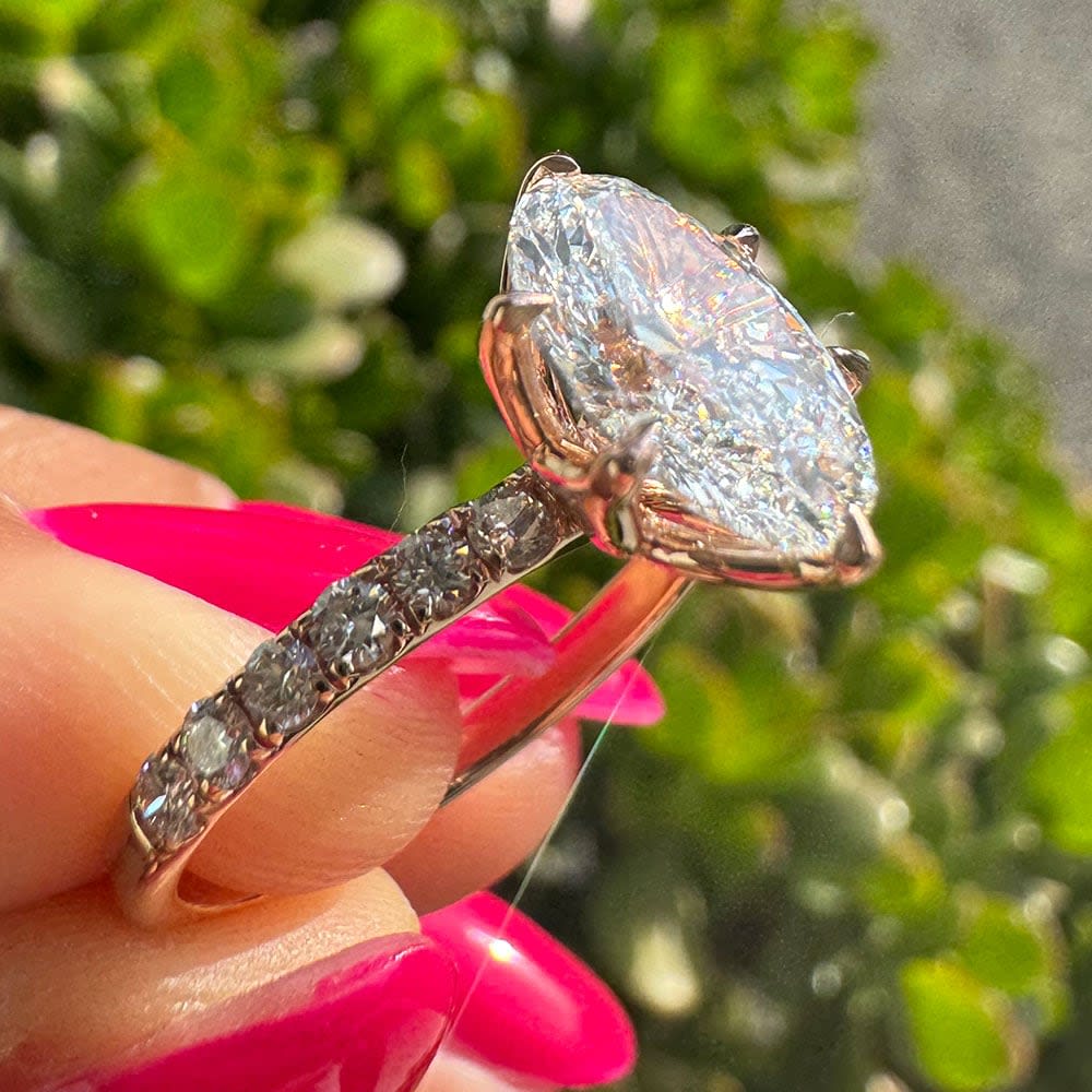 2 carat E VVS2 oval with tulip setting