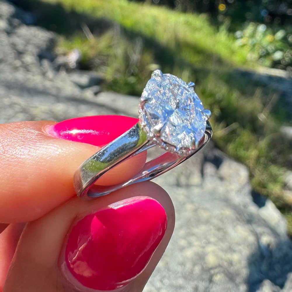 Oval diamond with a floating halo