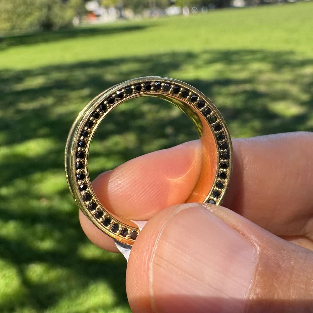 Elysium on gold band with black diamond