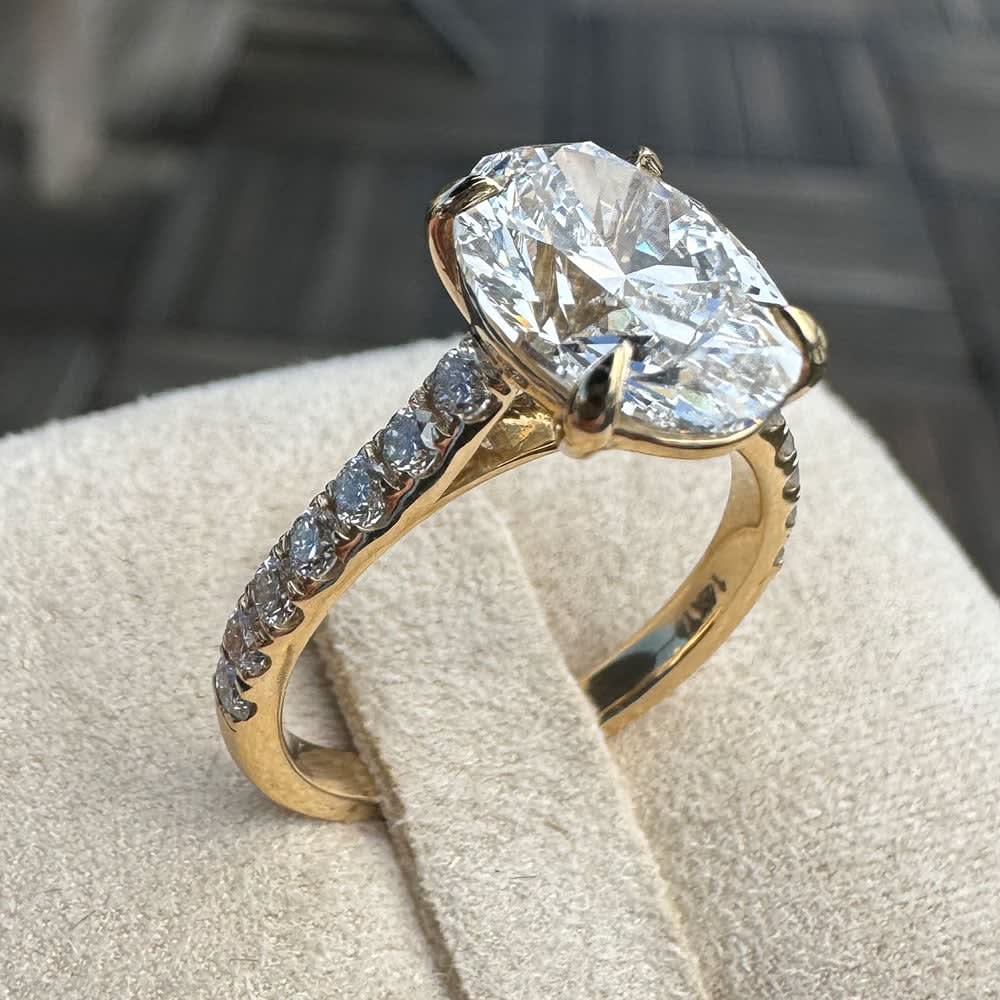 Yellow gold oval lab diamond with diamond band