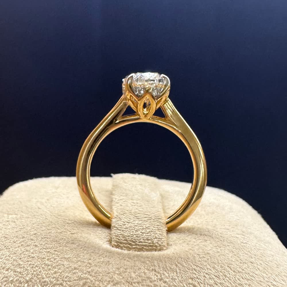 2 carat oval on a slight split gold band