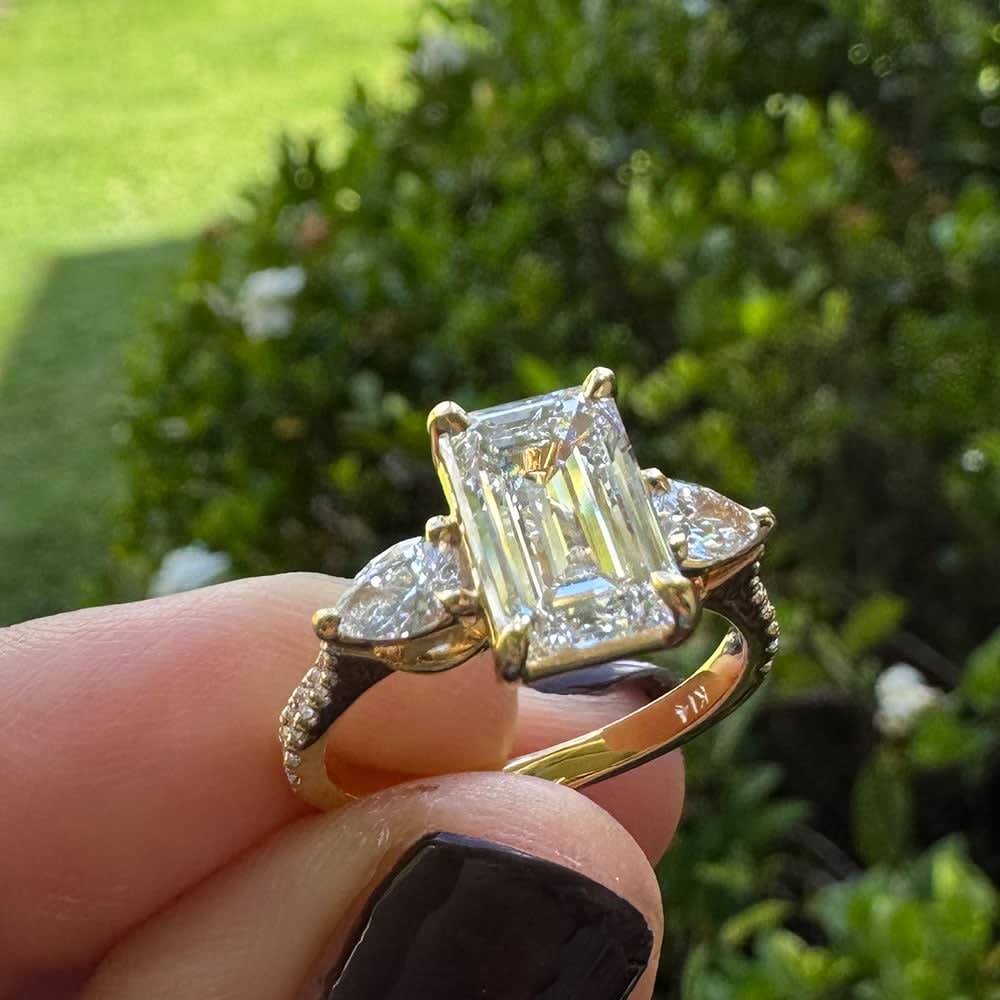 Emerald cut with pear sides ring